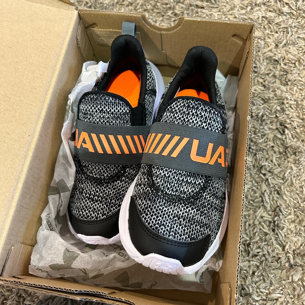 Never worn Under Armor Kids shoes